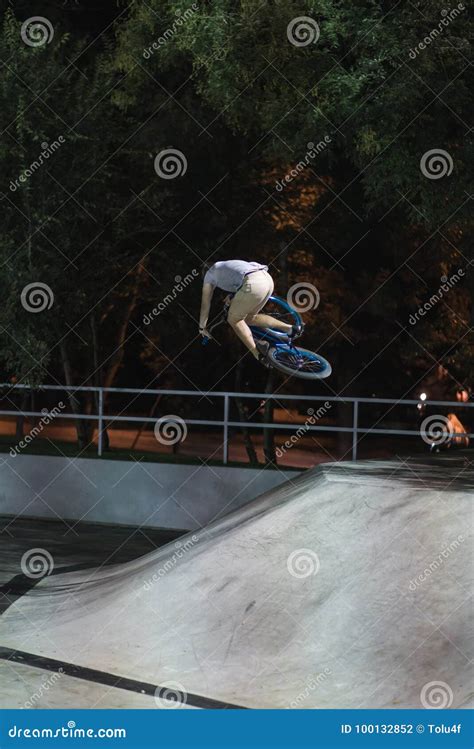 MTB Bicycle Rider Does Various Tricks while Riding in Skatepark ...