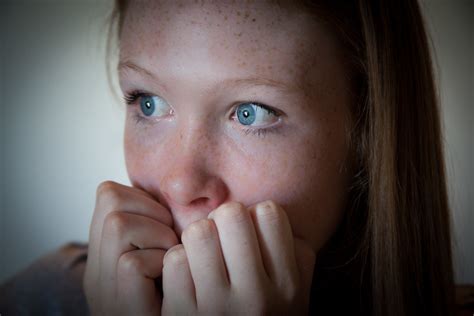 Nervous Woman | A woman bites her fingernails, representing … | Flickr