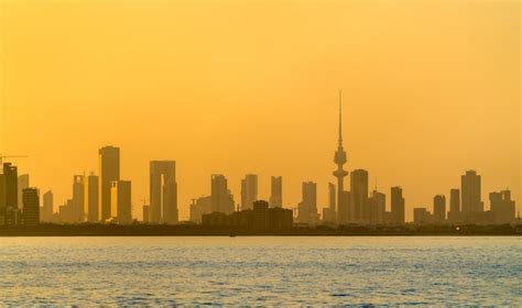 Premium Photo | Skyline of kuwait city at sunset the capital of kuwait the persian gulf region