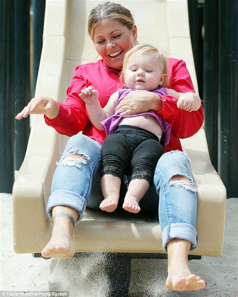 Former Baywatch star Nicole Eggert takes her daughter Keegan to a park ...