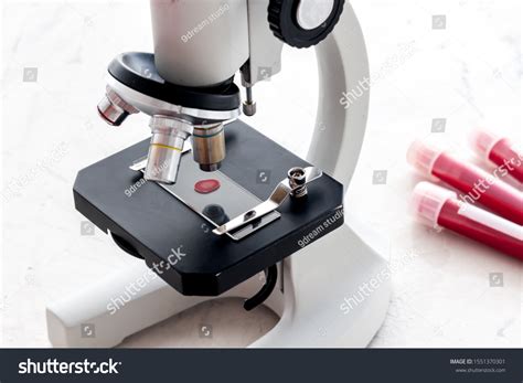 Blood Drop Under Microscope On White Stock Photo 1551370301 | Shutterstock