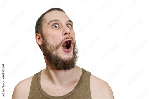 Very surprised scared funny face of a bearded guy with open mouth and ...