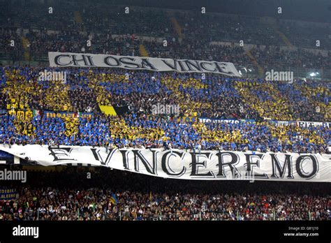 Inter Milan fans display a banner that reads 'who dares wins' Stock Photo - Alamy