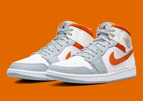 Air Jordan 1 Mid Orange Grey CW7591-100 | SneakerNews.com