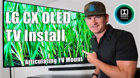 LG CX OLED Installed by a PRO on Sanus Full Motion Wall Mount - YouTube