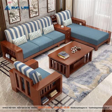 living room with blue and white striped couches, coffee table and end tables