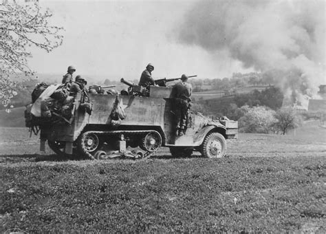 GIs in M3A1 half track attack near Wiezemburg Germany 1945 | World War Photos