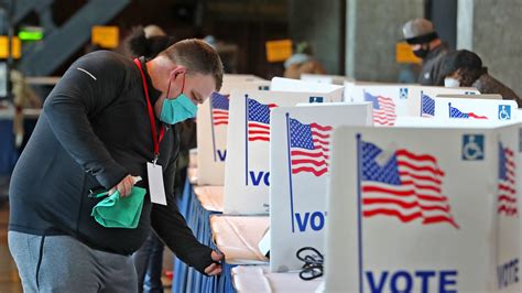 Early voting in Indiana means hours in line, 2 weeks in quarantine