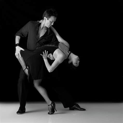 Couple Performing Salsa Dance Moves by Alfonse Pagano