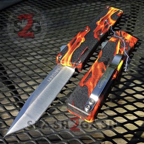 Lightning OTF Knife D/A Flame Fire Switchblade - Tanto Serrated ...