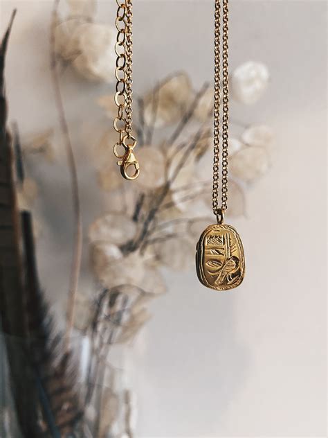 Gold scarab necklace