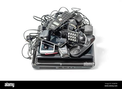 Electronic waste ready to recycle, isolated on white background. pile of mixed electronic waste ...