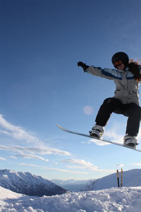 kristen snowboarding – Alaska Rivers Company