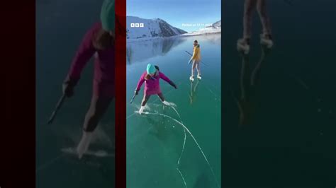 An ice rescue instructor and his wife skated on a rare 'ice-window' in ...