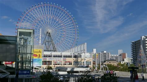 Urban view of the city of Osaka in Japan, Asia with ferris wheel and ...