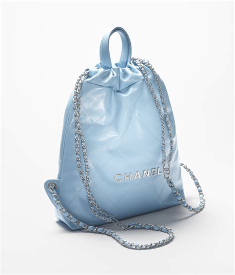 Chanel 22 backpack, Calfskin & silver metal, light blue — Fashion | CHANEL