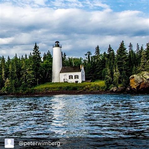 The Rock Harbor Lighthouse, located at the southwest entrance to Rock ...