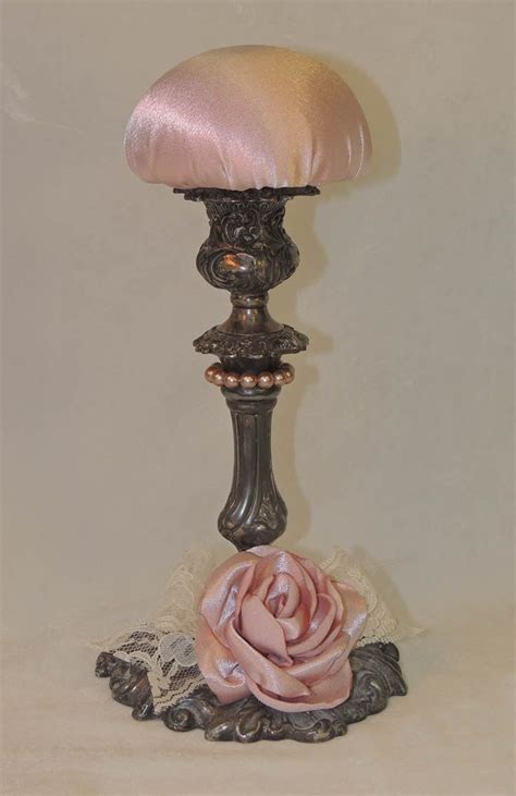 Victorian-inspired hat display stand. Antique silver candlestick handmade satin rose, beads ...