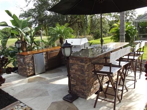 Outdoor Kitchens | Outdoor kitchen island, Outdoor kitchen design, Outdoor kitchen