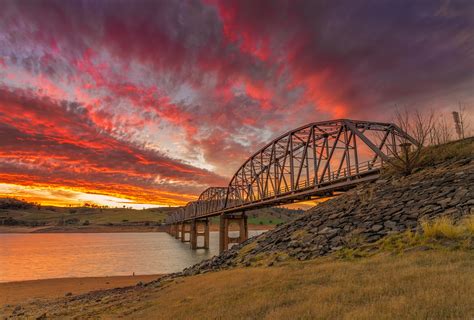 Download Cloud Hill Sunset Sky Man Made Bridge HD Wallpaper