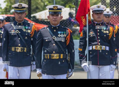 Philippine Marines stand in formation during a honors ceremony for ...