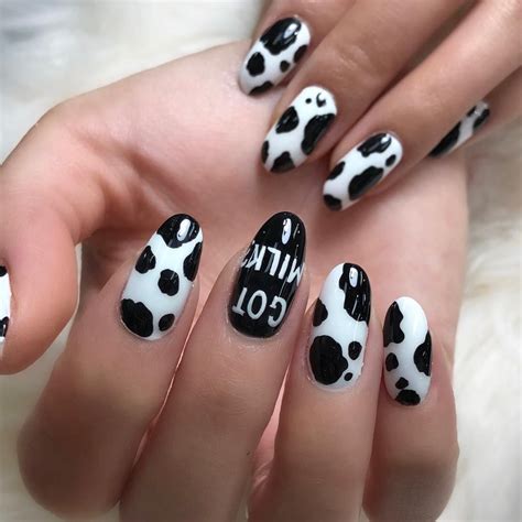 Cow Print Nails | Trending Animal Print of 2019 | Animal nail designs, Cow nails, Paw print nails