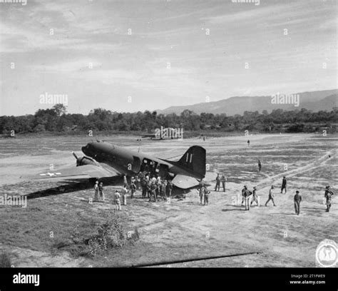 The British Army in Burma 1944 Casualties from the 36th Infantry Division being loaded into an ...