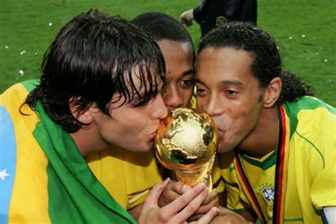 Favorite World Cup moment - Kaká, Robinho and Ronaldinho kissing the World Cup trophy in 2002. # ...