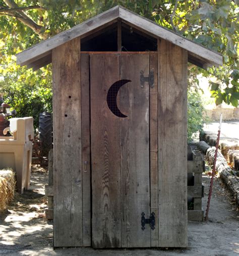 Why Do Outhouses Have a Crescent Moon on the Door?