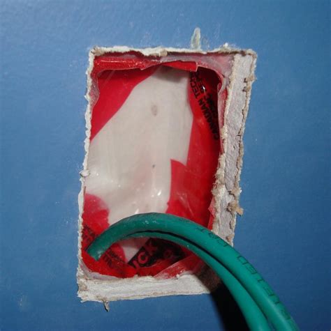 electrical - How do I retrofit a junction box in an insulated wall? - Home Improvement Stack ...