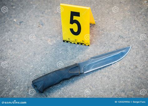 Crime Scene Investigation. the Weapon, a Knife. Stock Photo - Image of ...