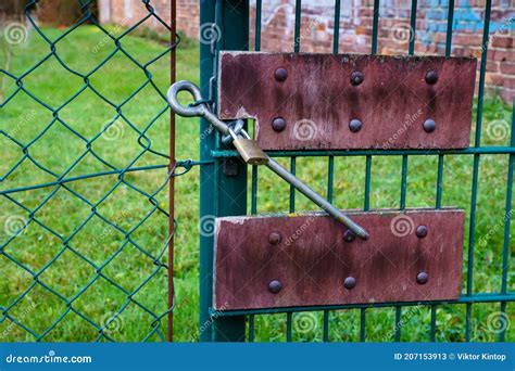 Chain Link Fence. Rusty Riveted Plates and Padlock Stock Image - Image of link, hard: 207153913