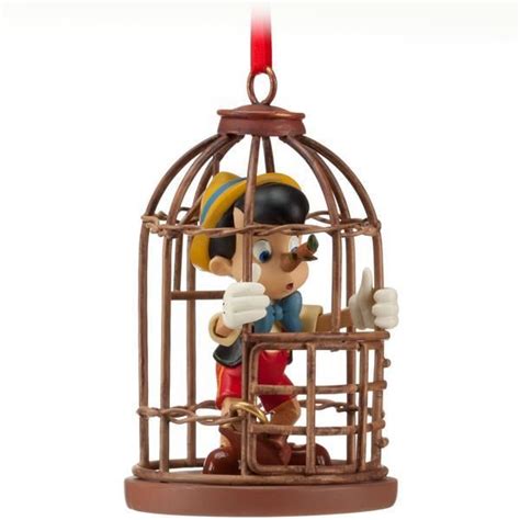 Pinocchio Christmas ornament from The Disney Store that my husband ...