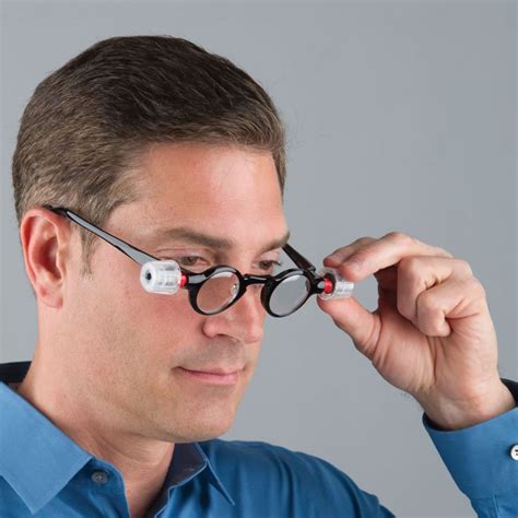 The Only Adjustable Focus Reading Glasses - Hammacher Schlemmer ...