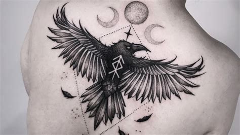 Inside The Dark And Mysterious Meanings Behind A Crow Tattoo