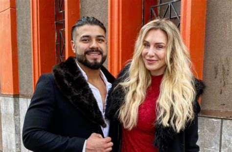 WWE Superstars Andrade And Charlotte Flair Announce Their Engagement ...