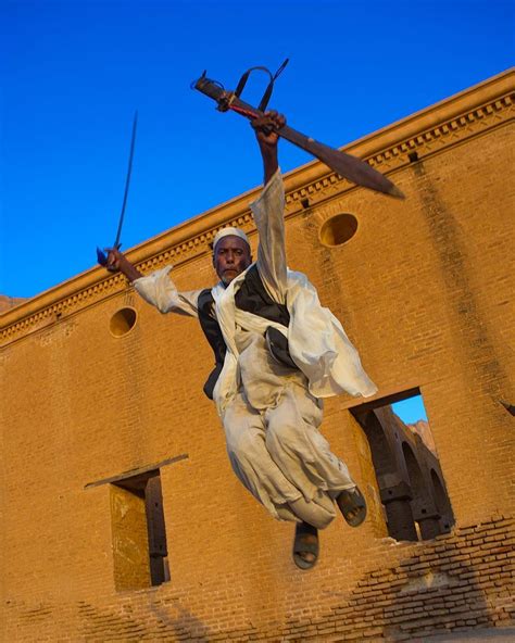 Beja men dancing in Kassala Sudan . It was not easy to meet Beja people as they do not see any ...