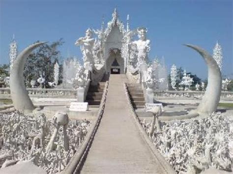 Wat Rong Khun, Chiang Rai, Thailand. Also known as The White Temple, it has paintings inside of ...