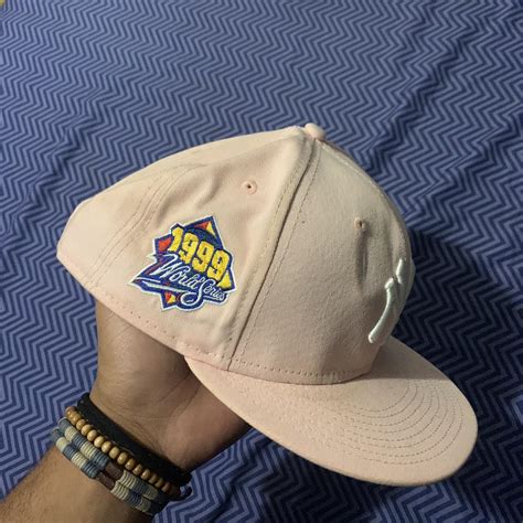 Pink Yankees snap back with yellow brim - Depop