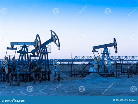 Oil pumps on a oil field. stock photo. Image of field - 55456142