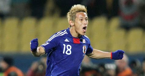 Japan's Keisuke Honda celebrates scoring against Denmark at at Royal ...