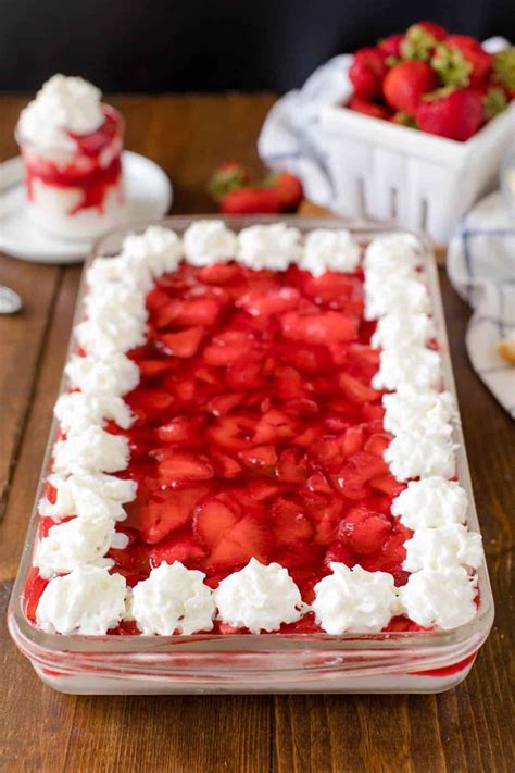 Strawberries in the Snow - Light angel food cake is layered on cream and covered in strawberries ...