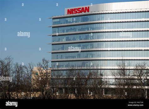 A logo sign outside of the headquarters of Nissan USA in Franklin ...