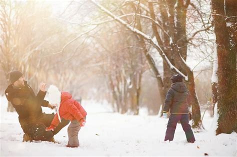 Premium Photo | Children in winter park play