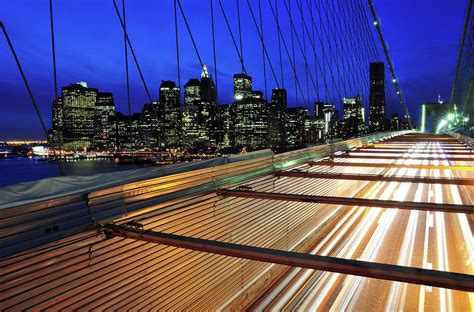 Cars Pass Over The Brooklyn Bridge With Photograph by Rachid Dahnoun - Fine Art America