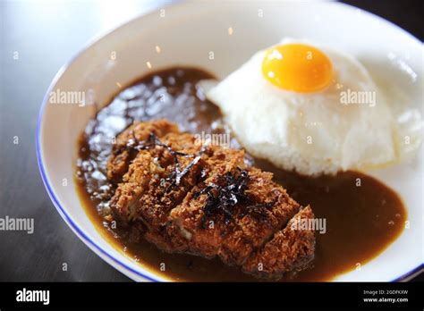 Curry rice with fried pork Stock Photo - Alamy