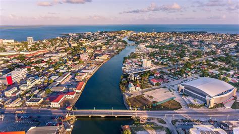 Aerial views of Belize City, Belcan Bridge to the Caribbean Sea, Bliss ...