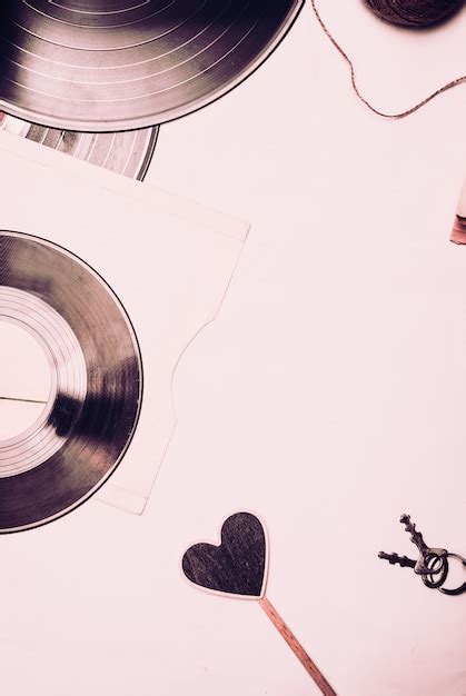 Premium Photo | Stack of scratched dusty old vinyl records tied with rope