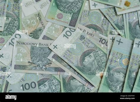 100 Polish zloty banknotes. PLN zł or złoty, the official currency of Poland. One hundred ...