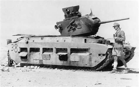 Afrika Korps Soldier Next to a KO British Matilda Tank named CRUCIBLE II | World War Photos